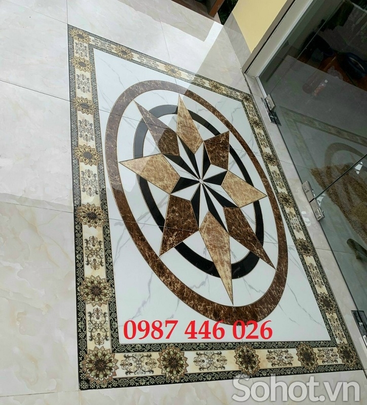 Gạch thảm chữ nhật khắc vàng lát hiên cửa