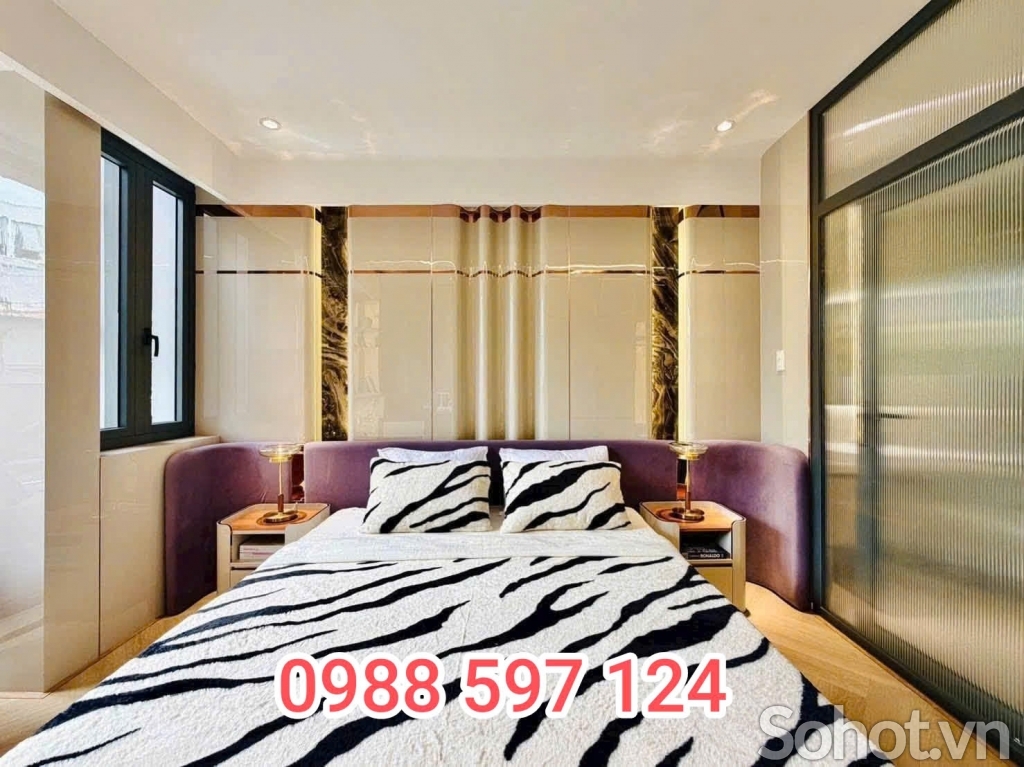 Cải tạo ốp tường phòng khách bằng tấm than tre