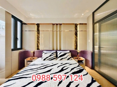 Cải tạo ốp tường phòng khách bằng tấm than tre